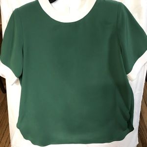Great condition emerald green with white collar & sleeves.